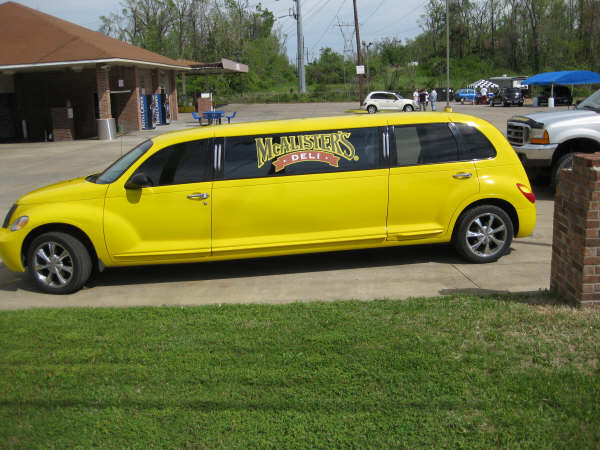 Stretched PT Cruiser showing the business McAlister's Deli